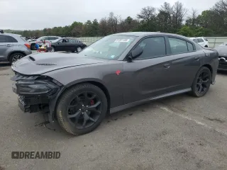 2016 Dodge Charger R/T with VIN 2C3CDXCT3GH298103, listed as a Copart auction lot 61351185 with 61,648 mi miles and Salvage title. Bid and sale history available at DreamBid. Image 1.