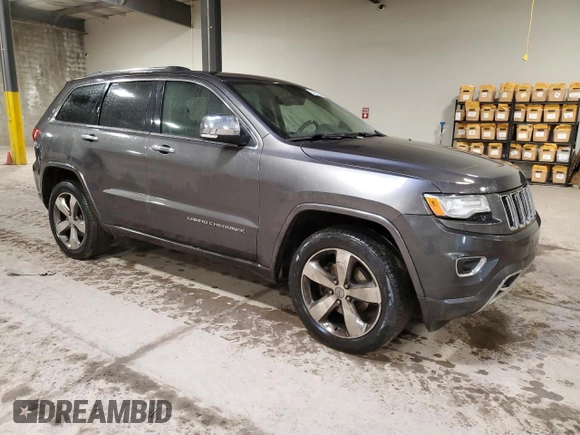 2015 Jeep Grand Cherokee Overland with VIN 1C4RJFCG5FC726086, listed as a Copart auction lot 42500475 with 113,031 mi miles and Clean Title. Bid and sale history available at carsss.com. Image 4.