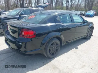 2013 Dodge Avenger SE with VIN 1C3CDZABXDN540331, listed as a IAAI auction lot 41889003 with 163,006 mi miles. Bid and sale history available at carsss.com. Image 4.