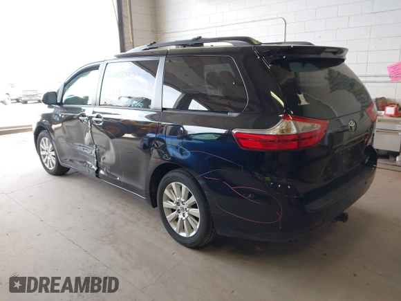 2015 Toyota Sienna Limited with VIN 5TDDK3DC9FS104493, listed as a IAAI auction lot 42055937 with 126,728 mi miles and . Bid and sale history available at DreamBid. Image 3.