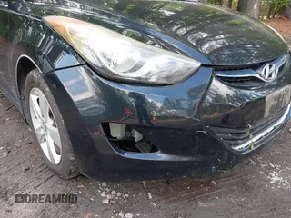 2013 Hyundai Elantra GLS z VIN KMHDH4AE0DU545363, wystawiony jako IAAI lot #42281675 z przebiegiem 129 249 mil mil oraz . Historia ofert i sprzedaży dostępna na DreamBid. Obrazek 6.
