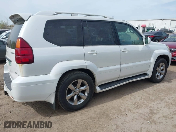 2004 Lexus GX 470 with VIN JTJBT20X440062559, listed as a IAAI auction lot 42142442 with 261,126 mi miles. Bid and sale history available at carsss.com. Image 13.