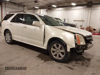 2007 Cadillac SRX with VIN 1GYEE637570125745, listed as a IAAI auction lot 41537912 with 203,108 mi miles. Bid and sale history available at carsss.com. Image 1.