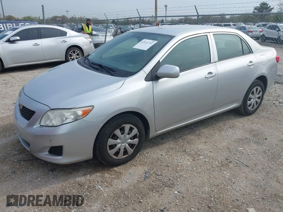 2009 Toyota Corolla with VIN JTDBL40EX9J029628, listed as a IAAI auction lot 42111711 with 168,226 mi miles. Bid and sale history available at carsss.com. Image 2.