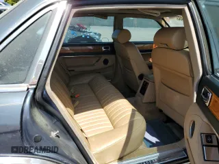 1992 Jaguar XJ with VIN SAJHY174XNC649368, listed as a Copart auction lot 50191454 with 99,553 mi miles and Salvage Title. Bid and sale history available at DreamBid. Image 10.