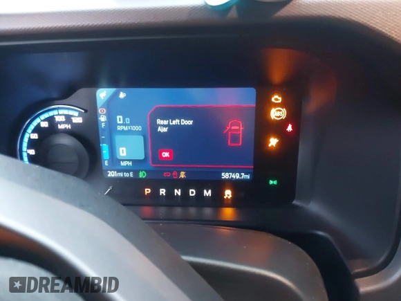 2023 Ford Bronco z VIN 1FMEE5DP3PLB33884, wystawiony jako IAAI lot #41202669 z przebiegiem 58 749 mil mil oraz . Historia ofert i sprzedaży dostępna na DreamBid. Obrazek 7.