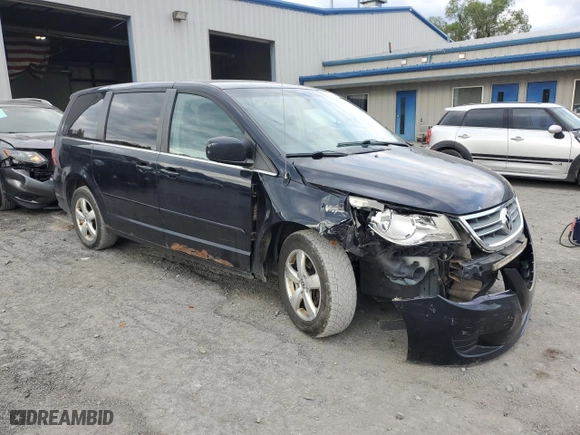 2010 Volkswagen Routan SE with VIN 2V4RW3D11AR262729, listed as a Copart auction lot 74123174 with 189,237 mi miles and Salvage Title. Bid and sale history available at carsss.com. Image 4.