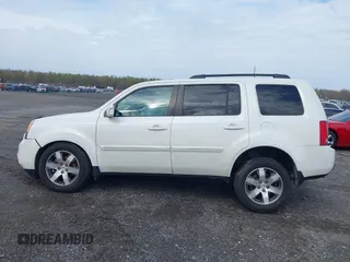2014 Honda Pilot Touring with VIN 5FNYF4H97EB046879, listed as a IAAI auction lot 42017280 with 167,564 mi miles and . Bid and sale history available at carsss.com. Image 15.
