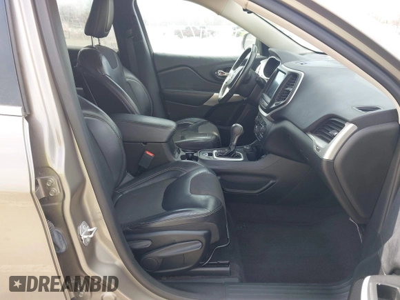 2018 Jeep Cherokee Latitude Plus with VIN 1C4PJMLXXJD571713, listed as a IAAI auction lot 41771661 with 87,580 mi miles and . Bid and sale history available at DreamBid. Image 5.