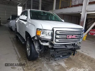 2018 GMC Canyon 4WD SLE z VIN 1GTG6CEN8J1148542, wystawiony jako IAAI lot #41630835 z przebiegiem 78 691 mil mil oraz . Historia ofert i sprzedaży dostępna na DreamBid. Obrazek 1.