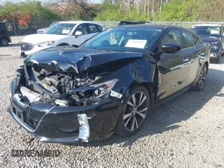 2017 Nissan Maxima S with VIN 1N4AA6AP3HC436857, listed as a IAAI auction lot 42043285 with 258,410 mi miles and . Bid and sale history available at DreamBid. Image 2.