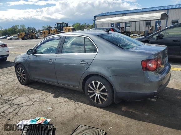 2009 Volkswagen Jetta SE with VIN 3VWRZ71K79M168084, listed as a Copart auction lot 57854825 with 150,986 mi miles and Salvage title. Bid and sale history available at DreamBid. Image 2.