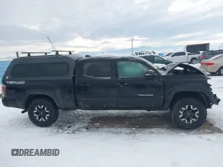 2023 Toyota Tacoma SR5 z VIN 3TMDZ5BN3PM169160, wystawiony jako IAAI lot #41276992 z przebiegiem 5 228 mil mil oraz . Historia ofert i sprzedaży dostępna na DreamBid. Obrazek 14.