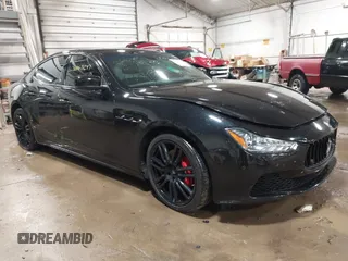 2014 Maserati Ghibli S Q4 z VIN ZAM57RTA3E1095225, wystawiony jako IAAI lot #41063247 z przebiegiem 43 005 mil mil oraz . Historia ofert i sprzedaży dostępna na DreamBid. Obrazek 1.