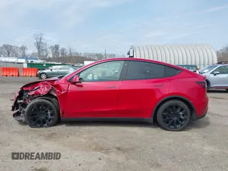2021 Tesla Model Y Long Range with VIN 5YJYGDEE0MF209191, listed as a IAAI auction lot 41937507 with 56,131 mi miles. Bid and sale history available at carsss.com. Image 13.
