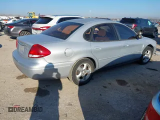 2004 Ford Taurus SE with VIN 1FAFP53U74A125083, listed as a IAAI auction lot 41637777 with 132,100 mi miles and . Bid and sale history available at DreamBid. Image 4.