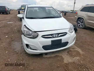 2012 Hyundai Accent GLS with VIN KMHCU4AEXCU069242, listed as a Copart auction lot 61475315 with 136,591 mi miles and Salvage title. Bid and sale history available at DreamBid. Image 5.