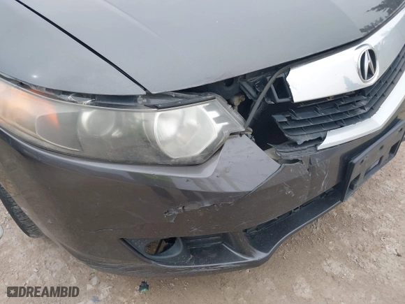 2009 Acura TSX with VIN JH4CU26629C033049, listed as a IAAI auction lot 41969918 with 122,772 mi miles. Bid and sale history available at carsss.com. Image 6.