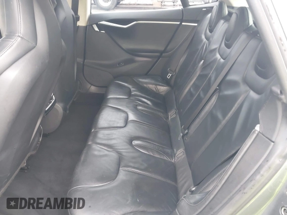 2013 Tesla Model S с VIN 5YJSA1CG5DFP06411, выставлен на аукционе IAAI как лот 41079914 с пробегом 266 968 миль миль и . История ставок и продаж доступна на DreamBid. Изображение 8.