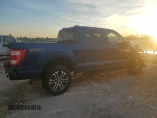 2023 Ford F-150 XL with VIN 1FTFW1E51PKF30933, listed as a Copart auction lot 82439694 with 26,267 mi miles and Salvage Title. Bid and sale history available at carsss.com. Image 3.