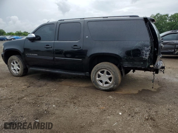 2008 Chevrolet Suburban LTZ with VIN 1GNFK16308J107400, listed as a Copart auction lot 61567295 with 272,454 mi miles and Salvage title. Bid and sale history available at DreamBid. Image 2.