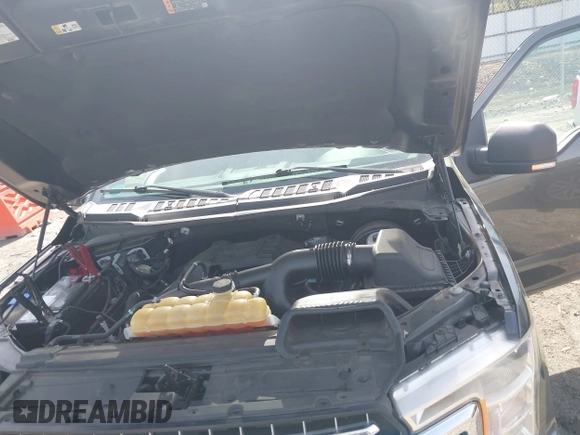 2018 Ford F-150 XL with VIN 1FTEW1CP2JFB50015, listed as a IAAI auction lot 41938177 with 248,137 mi miles and . Bid and sale history available at DreamBid. Image 10.