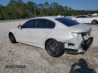 2022 BMW 3 Series 330e with VIN 3MW5P7J03N8C66082, listed as a Copart auction lot 50627595 with 70,799 mi miles and Salvage Title. Bid and sale history available at carsss.com. Image 2.