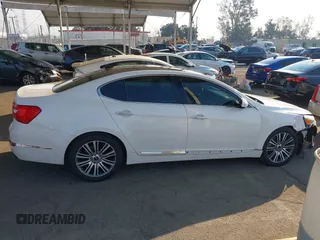 2014 Kia Cadenza Premium with VIN KNALN4D79E5157353, listed as a IAAI auction lot 41291153 with 141,049 mi miles. Bid and sale history available at carsss.com. Image 14.