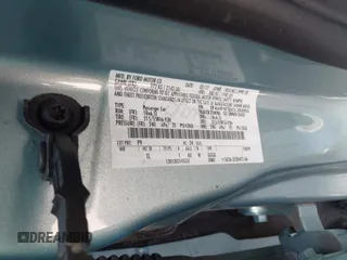 2012 Ford Focus SE z VIN 1FAHP3F22CL352952, wystawiony jako IAAI lot #42722671 z przebiegiem 126 923 mil mil oraz . Historia ofert i sprzedaży dostępna na DreamBid. Obrazek 9.
