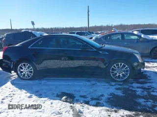 2013 Cadillac CTS Premium z VIN 1G6DS5E34D0160676, wystawiony jako IAAI lot #41262795 z przebiegiem 122 248 mil mil oraz . Historia ofert i sprzedaży dostępna na DreamBid. Obrazek 13.