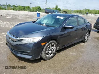 2017 Honda Civic LX z VIN 19XFC2F50HE010370, wystawiony jako Copart lot #56904975 z przebiegiem Nie podano mil oraz Szkoda całkowita • Salvage title. Historia ofert i sprzedaży dostępna na DreamBid. Obrazek 1.