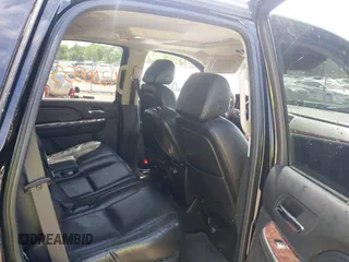 2008 Cadillac Escalade z VIN 1GYEC63818R112129, wystawiony jako IAAI lot #42005558 z przebiegiem 162 875 mil mil oraz . Historia ofert i sprzedaży dostępna na DreamBid. Obrazek 8.