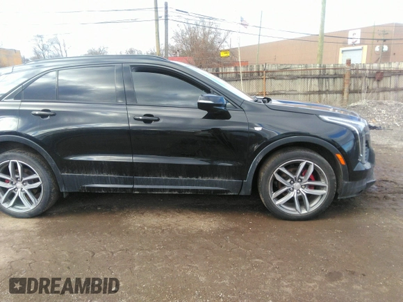 2021 Cadillac XT4 AWD Sport with VIN 1GYFZFR48MF009552, listed as a IAAI auction lot 41743125 with 53,982 mi miles and . Bid and sale history available at DreamBid. Image 13.