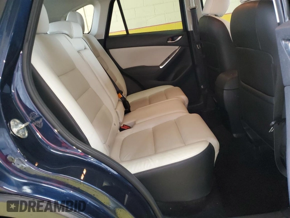 2016 Mazda CX-5 Grand Touring with VIN JM3KE4DY0G0813499, listed as a Copart auction lot 54174805 with 116,709 mi miles and Clean Title. Bid and sale history available at carsss.com. Image 11.