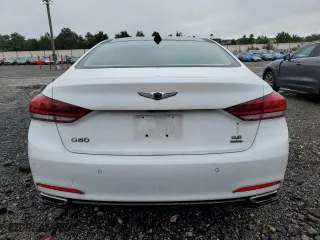 2017 Genesis G80 3.8L with VIN KMHGN4JE7HU177405, listed as a Copart auction lot 73409764 with 69,872 mi miles and Salvage Title. Bid and sale history available at carsss.com. Image 6.