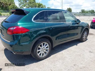 2014 Porsche Cayenne with VIN WP1AA2A21ELA06570, listed as a IAAI auction lot 42473298 with 61,421 mi miles and . Bid and sale history available at DreamBid. Image 4.