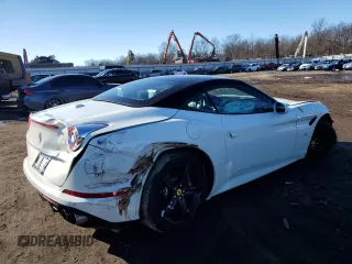2016 Ferrari California T z VIN ZFF77XJA2G0213103, wystawiony jako Copart lot #43268564 z przebiegiem 12 200 mil mil oraz Szkody całkowita. Historia ofert i sprzedaży dostępna na DreamBid. Obrazek 3.