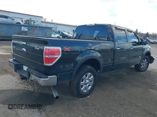 2013 Ford F-150 XL with VIN 1FTFW1ET0DFB39467, listed as a IAAI auction lot 40770557 with 166,779 mi miles and . Bid and sale history available at DreamBid. Image 4.