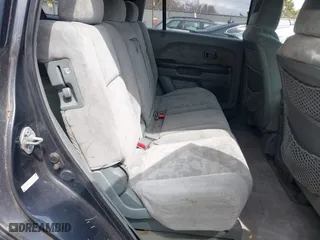 2004 Honda Pilot EX with VIN 2HKYF18494H557884, listed as a IAAI auction lot 42075748 with 205,723 mi miles. Bid and sale history available at carsss.com. Image 8.