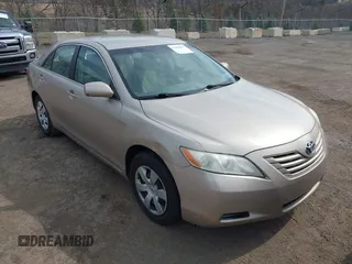 2009 Toyota Camry with VIN 4T1BE46K99U834926, listed as a IAAI auction lot 41853947 with 214,044 mi miles. Bid and sale history available at carsss.com. Image 1.