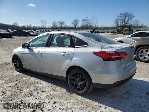 2016 Ford Focus SE with VIN 1FADP3F26GL332241, listed as a Copart auction lot 41868995 with 162,401 mi miles and Salvage Title. Bid and sale history available at DreamBid. Image 2.