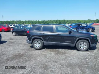 2015 Jeep Cherokee Sport z VIN 1C4PJMAB8FW610348, wystawiony jako IAAI lot #42532550 z przebiegiem 157 293 mil mil oraz . Historia ofert i sprzedaży dostępna na DreamBid. Obrazek 13.