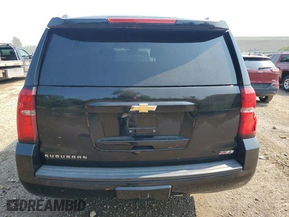 2015 Chevrolet Suburban LT with VIN 1GNSKJKC8FR551790, listed as a Copart auction lot 64694485 with 187,367 mi miles and Clean title. Bid and sale history available at DreamBid. Image 6.