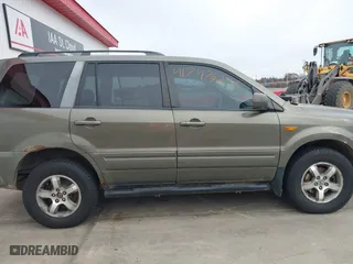 2007 Honda Pilot EX-L with VIN 2HKYF18767H538207, listed as a IAAI auction lot 41747624 with 214,026 mi miles. Bid and sale history available at carsss.com. Image 14.
