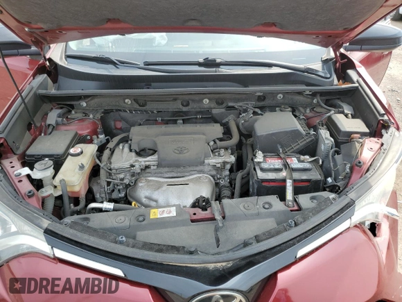 2018 Toyota RAV4 LE with VIN JTMBFREV2JD233808, listed as a Copart auction lot 59021235 with 71,430 mi miles and Salvage title. Bid and sale history available at DreamBid. Image 12.