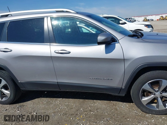 2021 Jeep Cherokee Limited z VIN 1C4PJMDX5MD119056, wystawiony jako IAAI lot #41828573 z przebiegiem 56 507 mil mil oraz . Historia ofert i sprzedaży dostępna na DreamBid. Obrazek 13.