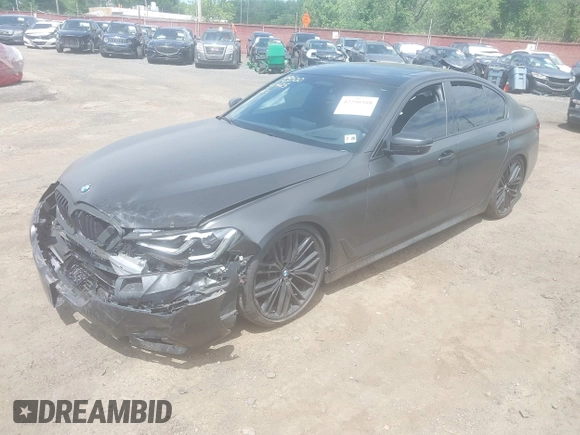 2023 BMW 5 Series M550i xDrive with VIN WBA13BK02PCN47443, listed as a IAAI auction lot 42290388 with Not provided miles and . Bid and sale history available at DreamBid. Image 2.
