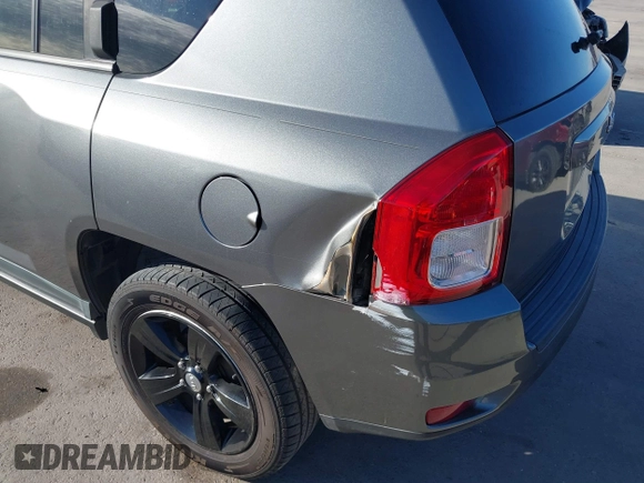 2011 Jeep Compass with VIN 1J4NT1FA0BD246586, listed as a IAAI auction lot 41253630 with 120,540 mi miles. Bid and sale history available at carsss.com. Image 6.