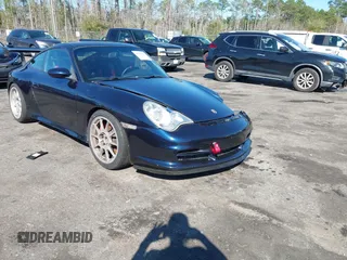 2004 Porsche 911 z VIN WP0AC29954S692825, wystawiony jako IAAI lot #41781530 z przebiegiem 28 942 mil mil oraz . Historia ofert i sprzedaży dostępna na DreamBid. Obrazek 1.