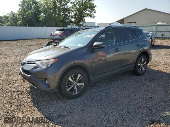 2016 Toyota RAV4 XLE with VIN JTMRFREV0GJ082234, listed as a Copart auction lot 64941855 with 193,270 mi miles and Salvage title. Bid and sale history available at DreamBid. Image 1.
